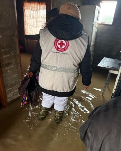 Volunteers assessing damage in flooded areas of Bergman